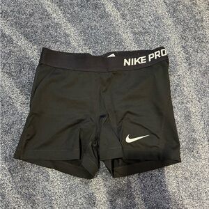 Black Nike pro spandex shorts.